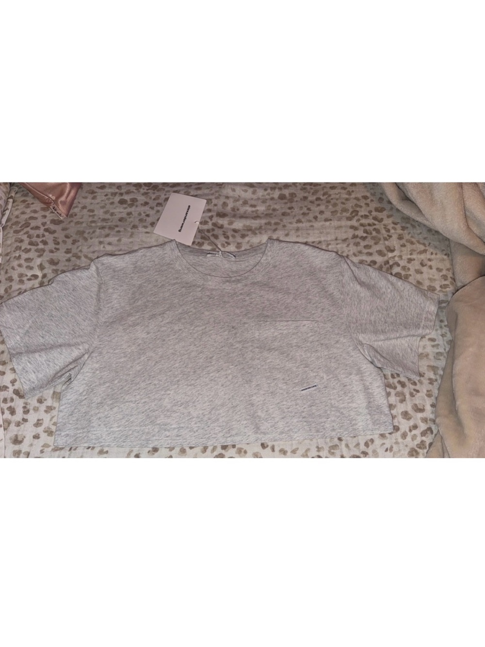 ALEXANDER WANG 
DTC HIGH TWIST CROP TOP